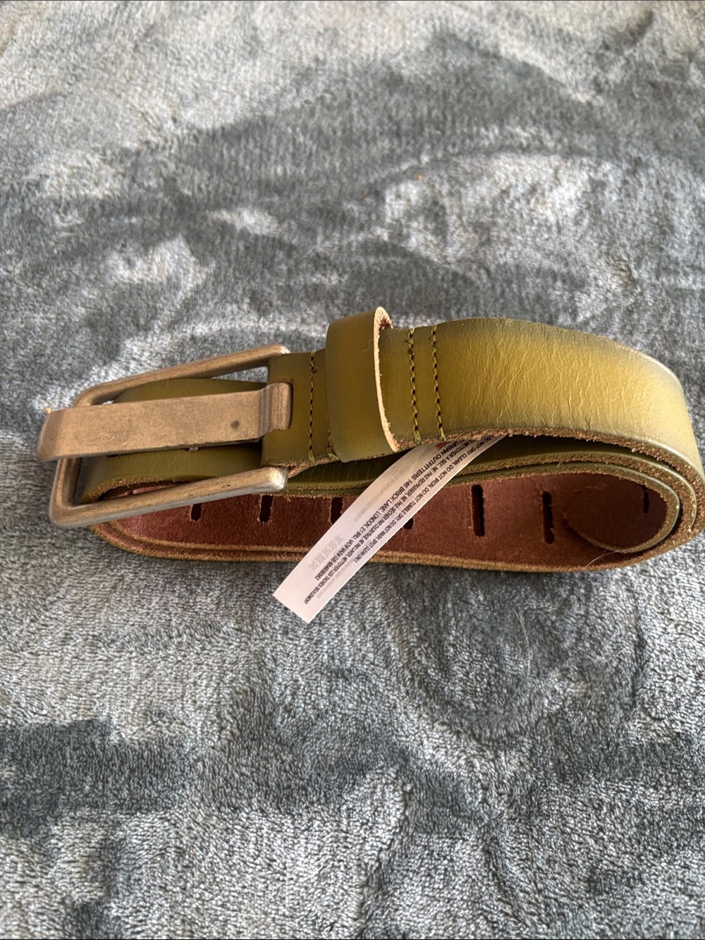 We are free Women’s distressed olive colored belt with distressed type leather